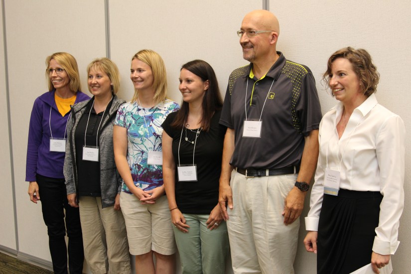 Pictured left to right are scholarship winners Carla Madson of the Urbandale Community School District, April Moffitt of the Emmetsburg Community School District, Jen Snyder of the Colfax-Mingo School District, LaRae Arment of the Alburnett Community School District, David Becker of the Ottumwa School District, and Iowa Jump$tart President Mary Sandvig.