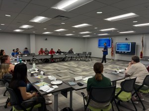 Kaleb Stevens presenting to a group of Iowa educators during the conference.